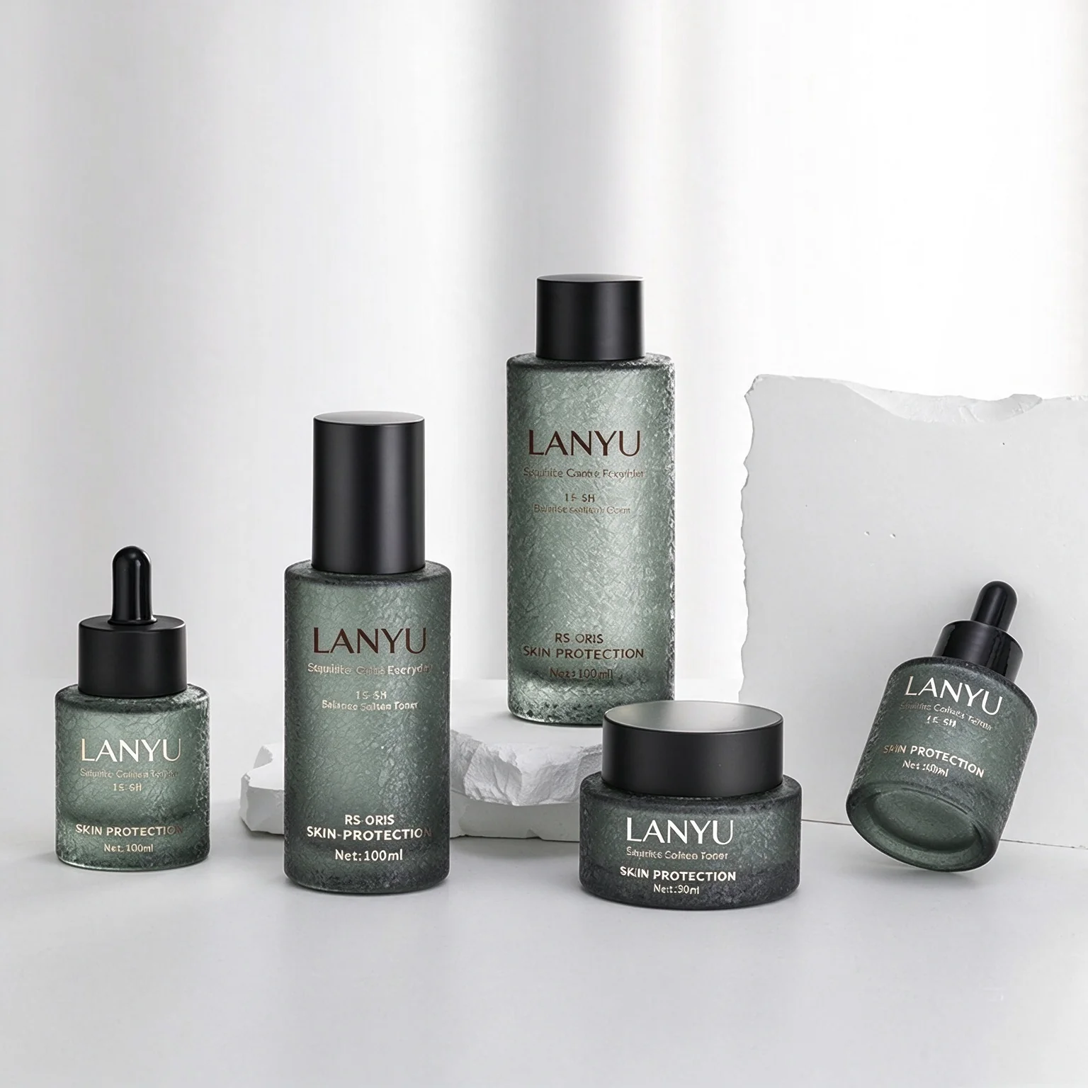 LANYU coordinated textured glass skincare collection with jars and dropper bottles